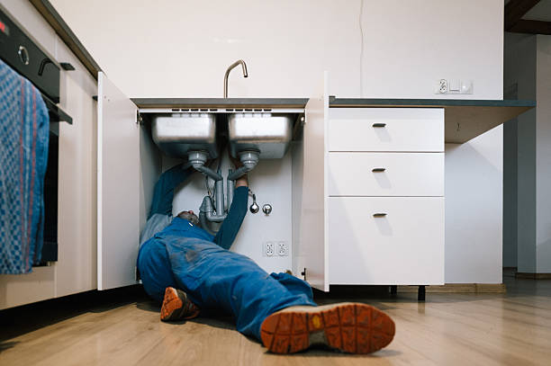 Professional Emergency Plumber technician working in Hopedale, MA